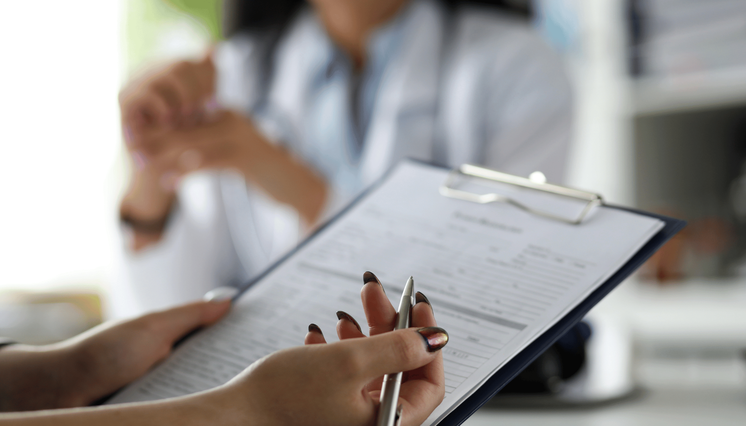 Participant signing up for a paid clinical trial in the UK.