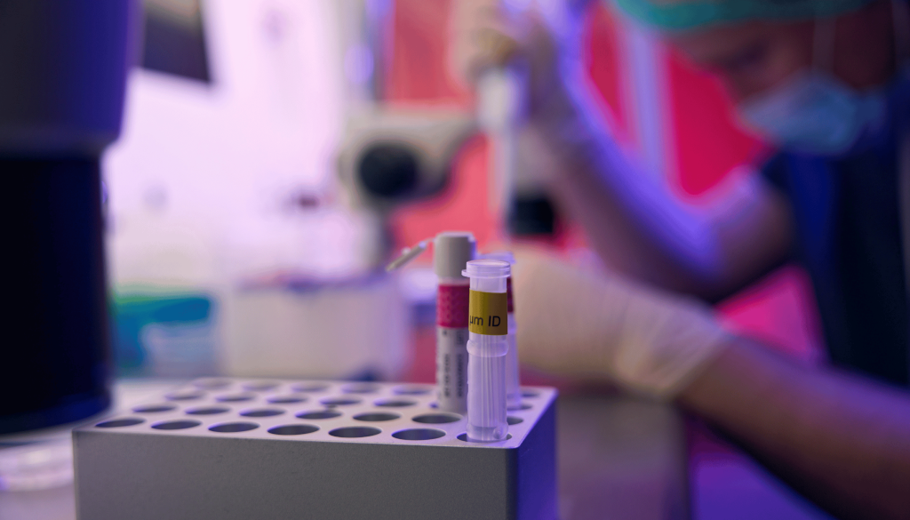 Researchers conducting good lab clinical trials in a certified laboratory.